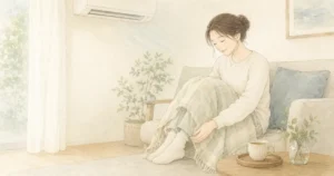 冷房による足先の冷えが気になる女性の様子を描いたシエスタ瀬戸西店のイメージ